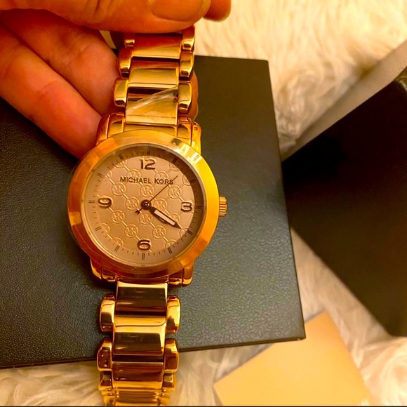 Women’s Rose gold Micheal KORS watch